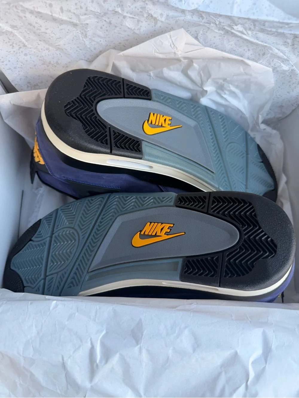 Jordan 4 Purple and Black High-Top Sneakers with Yellow Jumpman